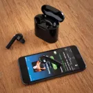 Auriculares inalámbricos Liberty en caja de carga