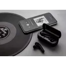 Free Flow TWS earbuds in charging case